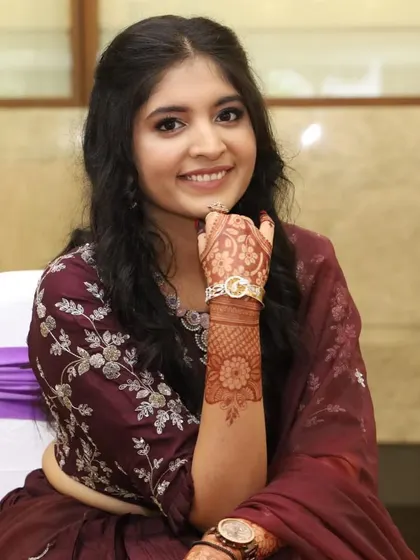 Another lovely portrait showcasing her natural beauty enhanced by a subtle makeup application.
