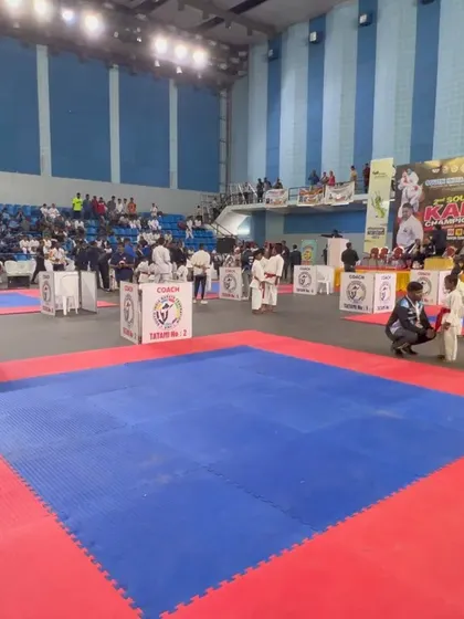 A view of the competition floor at the South India Karate Championship. We prepare our students to perform with confidence in large stadium environments.