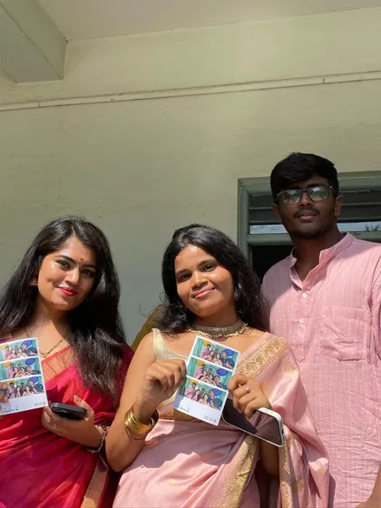 Three friends from SVCE with their colorful photo strips.