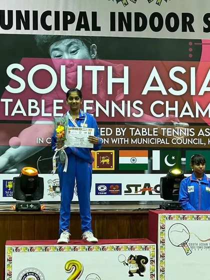 Divyanshi on the podium after winning gold in team events and silver in singles at the South Asian Table Tennis Championship in Sri Lanka.