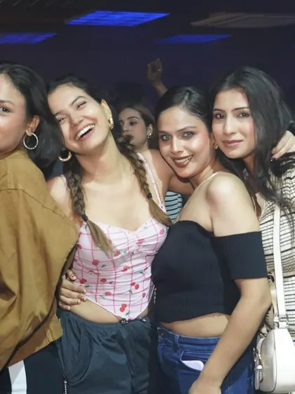 A group of ladies having fun on the dance floor.