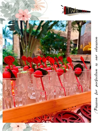 Close-up of our bespoke cocktail picks, designed to match the event's theme and add a special touch to each glass.
