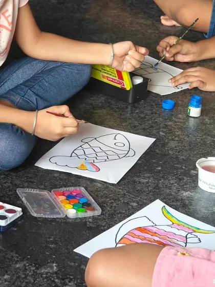 Learning is a hands-on adventure at Vyoma. Here, our 'putta puttis' are busy painting props for their upcoming play. We believe in a holistic theatre education where children are involved in the entire creative process, from script to stage.
