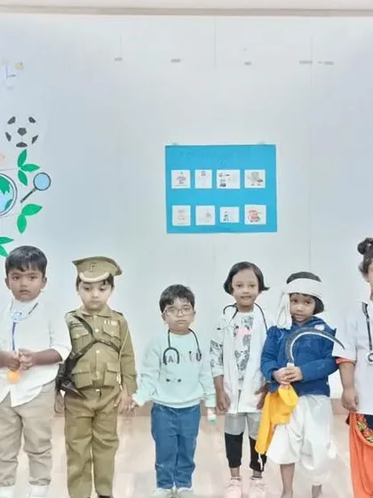 A class of future community helpers, with students dressed as soldiers, doctors, and police officers, learning about service and responsibility.