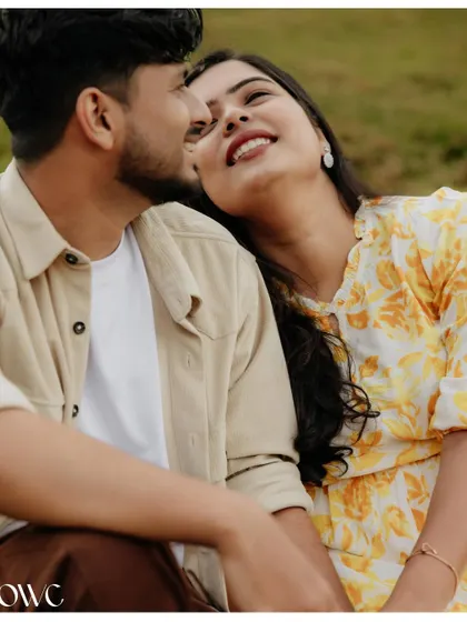 A close-up shot capturing the adoration in a couple's eyes as they share an intimate moment during their outdoor pre-wedding shoot.