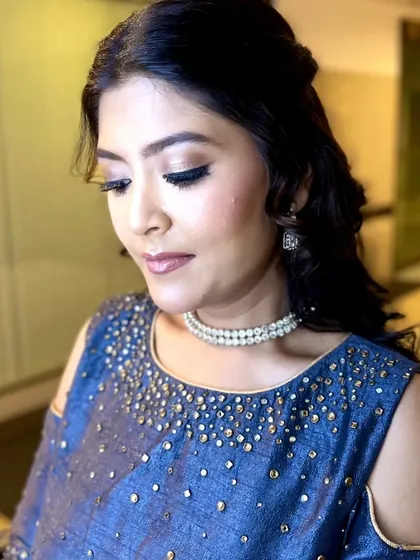 A soft and elegant party makeup look I demonstrated in a class at Lakme Academy. This style is versatile and teaches students how to create a sophisticated look for clients.