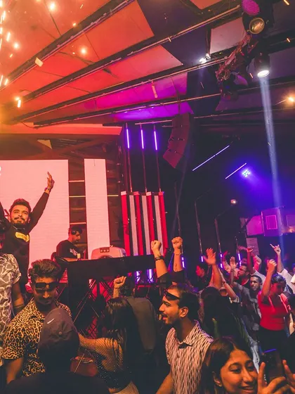 A celebration on stage with sparklers and a hyped-up crowd. Every night is a reason to celebrate.