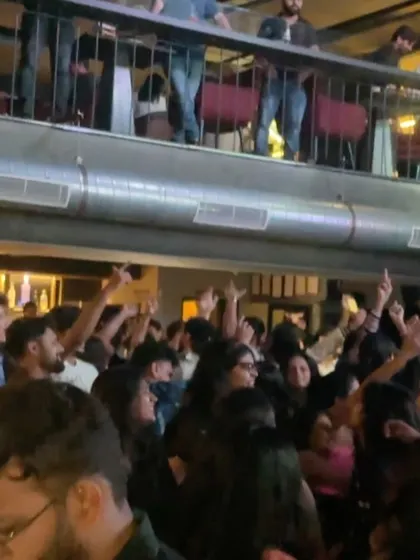 A view of the packed, two-level club. No matter where you are in the venue, you're part of the party.