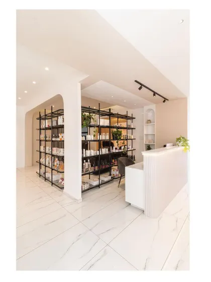 The reception and retail area is designed to be welcoming and easy to navigate, with clear sightlines and an uncluttered layout.
