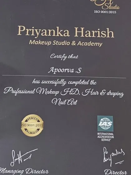 A close-up of my certificate for Professional Makeup HD, Hair & Draping, and Nail Art. I believe in continuous learning to master my passion and bring your vision to life.