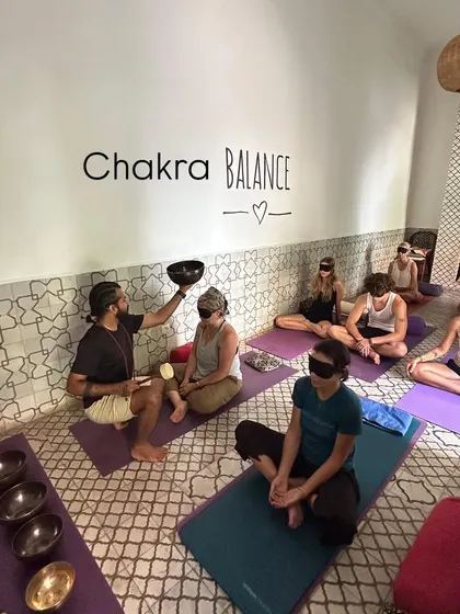 A chakra balancing session with singing bowls in Marrakech.