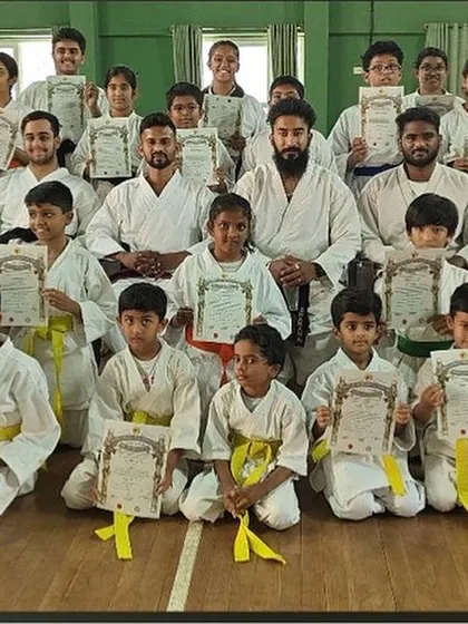 The proud result of hard work. Here is our Marathahalli dojo's summer camp batch after their successful Kyu grading, holding their certificates with pride. We believe in providing clear goals and celebrating every milestone.