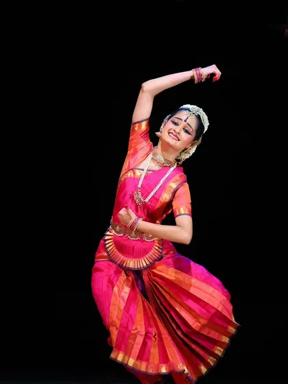 A dynamic and graceful movement from Srujana's performance. It is a joy to watch a student embody the rhythm and flow of the dance with such ease.