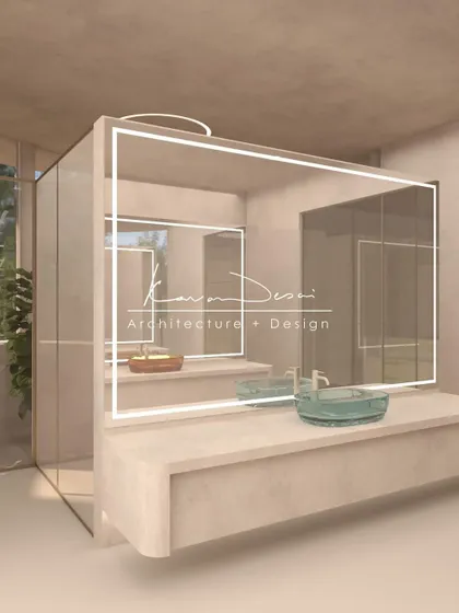 We created a sense of quiet symmetry in this bathroom by placing two basins opposite each other. The design plays with perspective and flow, while the LED-backlit mirrors add a modern touch.