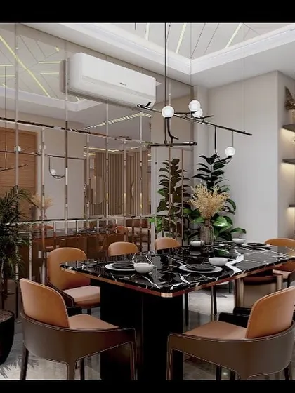 An elegant and cozy dining area designed for a client in Vasant Kunj. I used a black marble table and a mirrored wall to create a sense of depth and luxury, perfect for intimate dinners.