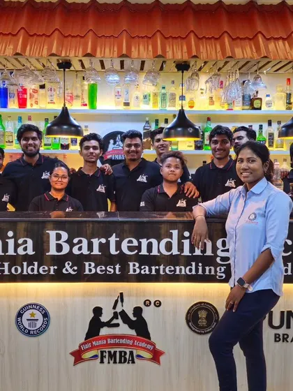 Our team and the new March 2024 batch at the fully-stocked bar of our Pune branch.