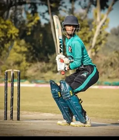 A batsman, focused and ready at the crease during a competitive match. Our training camps emphasize real match preparation, ensuring every player develops the technique and temperament to face any bowler with confidence. This is where practice meets performance.