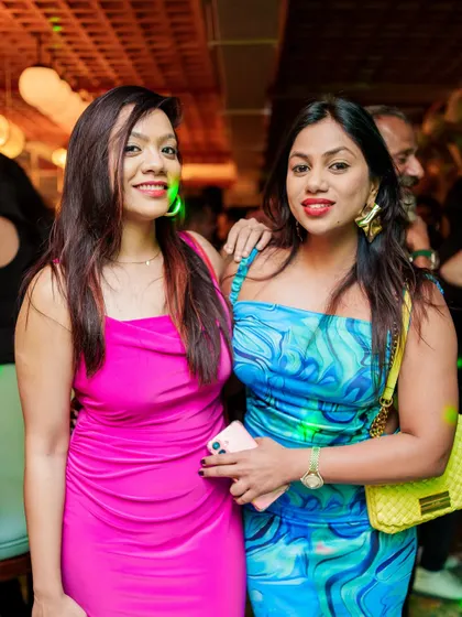 The vibrant and stylish crowd at VIBE CHECK. These guests brought the color and the energy to our throwback night.