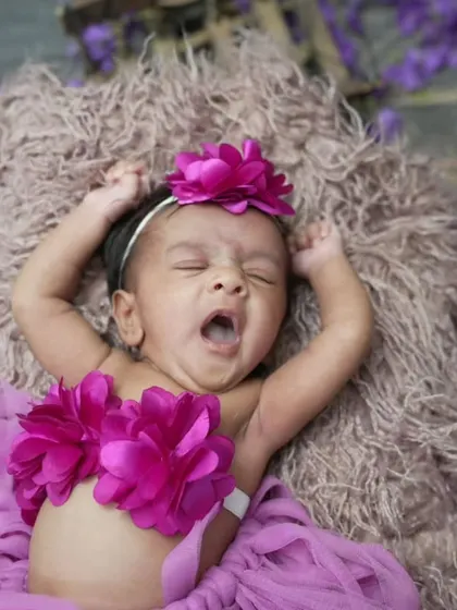 A sleepy yawn from a flower princess. I always take my time and wait for these candid, adorable moments during a session.