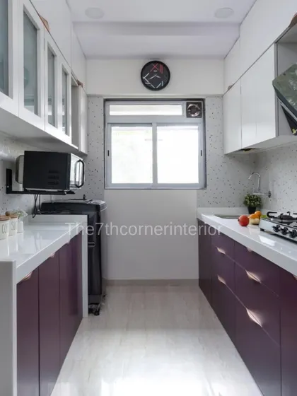 A before-and-after comparison showcasing the transformation of a kitchen into a modern, functional, and stylish space. The new design is a perfect blend of bold color and clean lines.