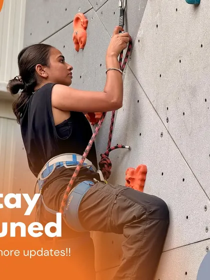 A female competitor prepares to clip in during The Crux League. Our events provide a supportive atmosphere for climbers of all genders to push their boundaries and compete.