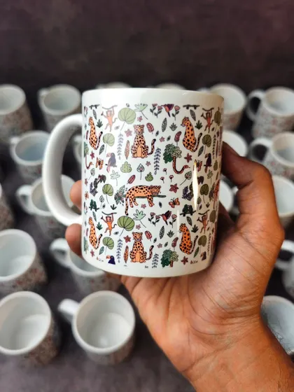 Your mug can be a canvas for any design. This one features a full-wrap jungle animal pattern, showing the versatility of my custom printing services for bulk or single orders.