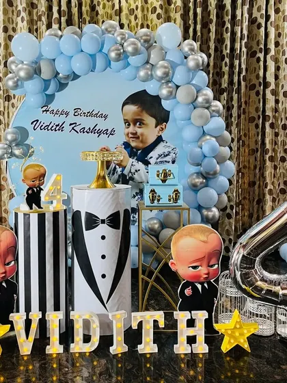 For the little boss in your life. This Boss Baby themed birthday party features a cool blue and silver palette, character cutouts, and a personalized backdrop.