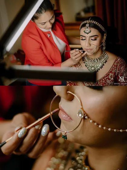 A behind-the-scenes look at the makeup artist giving the final touches to the bride.