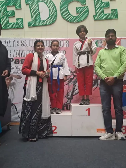 Another shot of our Poomsae champion on the victory stand.