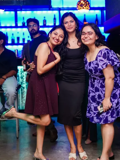 A fun night out with friends, enjoying the music and the vibrant atmosphere of the club.