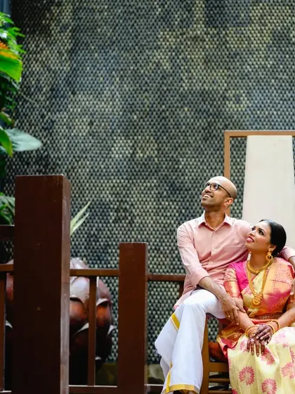 Still looking for that bird. This shot captures a genuine, shared moment between Amrutha and Ashwin, even if they weren't looking at me.