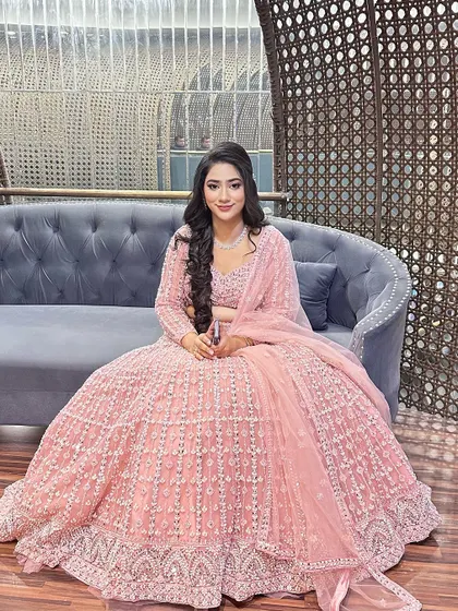 The final look for her engagement ceremony. She looks confident and beautiful, ready to celebrate her special moment.