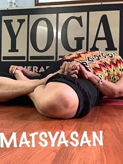 A variation of Fish Pose in full lotus, which adds a deep hip-opening element to the backbend.