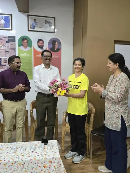 Malvika Bansod being presented with a bouquet during her felicitation, a small token of our appreciation for her hard work.