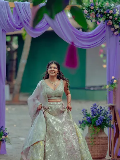 A duplicate image of the bride's stunning entrance, capturing her happiness and the beauty of the decor.