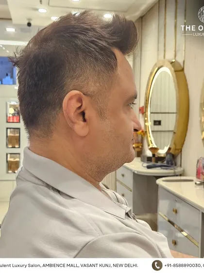 A side view of this modern men's cut, showing the clean lines and expert blending of the fade.