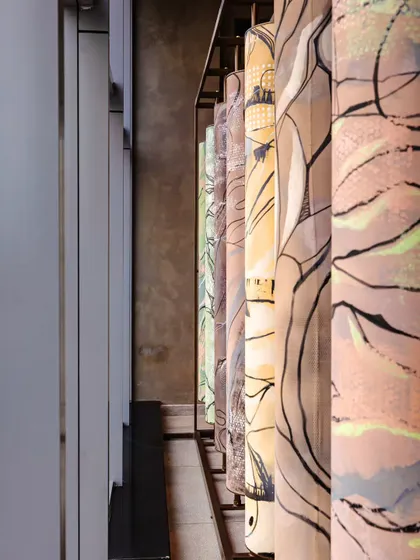 A prominent art installation inspired by Buddhist prayer wheels greets visitors at Anthea Pharma. The rotating wheels, adorned with intricate artwork, evoke a sense of calm and serenity.