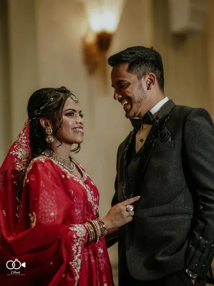 A duplicate of the candid laughing moment, a testament to the couple's joyful connection.
