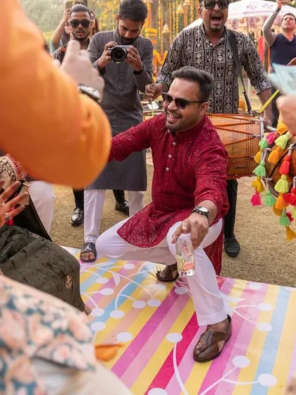 A guest showing off his best moves to the beat of the dhol.