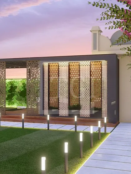 A render for a Jaipur project, featuring a large lawn, a gazebo with intricate screens (jaali work), and a beautiful feature wall, blending traditional Rajasthani elements with modern design.