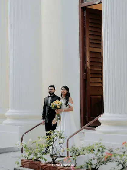 The bride and groom emerging from the church, ready to start their reception.