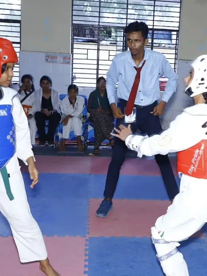The intensity of a real match. Two of our young female athletes face off in a sparring competition, showcasing the skills, focus, and courage we instill in our training.