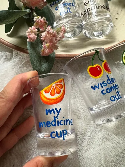 Another one of our new shot glass designs, featuring fruity illustrations and quirky quotes like "my medicine cup" and "wisdom comes out".
