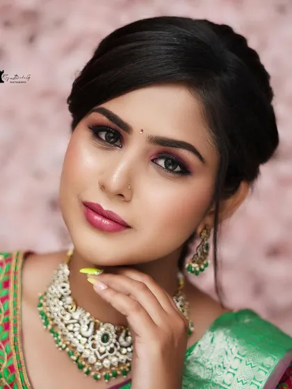 This is the level of artistry you will learn to achieve. This close-up from a live class demonstration shows a modern South-Indian bridal look with a focus on blended eyeshadow, defined brows, and a radiant skin finish.