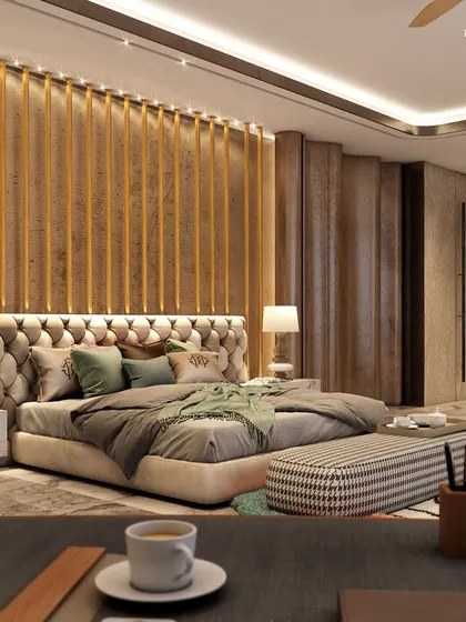 This opulent bedroom blends a modern aesthetic with extravagant materials and rich colors. A tufted headboard, vertical wood paneling, and a unique patterned rug create a haven of style and comfort for sophisticated living.