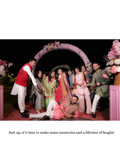 A fun and candid group photo with friends, capturing the playful and celebratory spirit of the Mehendi or Sangeet night.