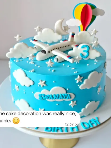 "The cake decoration was really nice, thanks." Simple, sweet, and appreciated feedback for the airplane-themed birthday cake.
