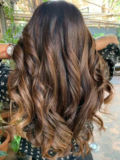 The after shot of our warm brunette transformation. The hair is so much healthier and shinier. (No filter)