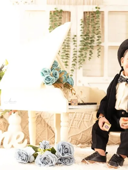 Looking sharp and sweet for his first birthday photos, this little boy is a natural in front of the camera.