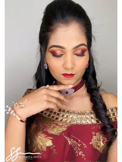 Another detailed view of the eye makeup and accessories. The rich, warm tones on the eyes are perfect for evening events and Indian festive wear.